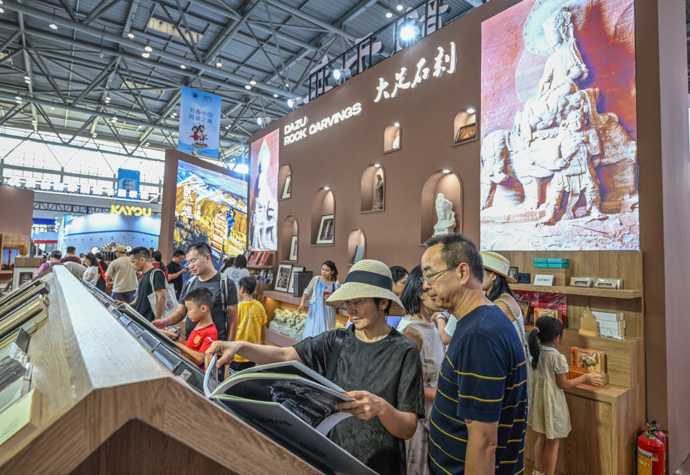 窟为魂书为骨！逛“龛韵千年”感受石窟艺术千年文脉与当代传承