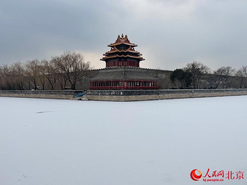 组图：北京迎2022年初雪 故宫覆盖白雪更显魅力