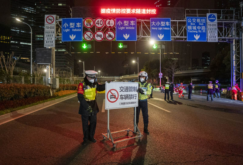 花儿依旧笑春风，一组图看申城战“疫”日常
