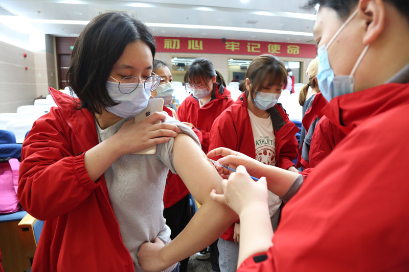 花儿依旧笑春风，一组图看申城战“疫”日常