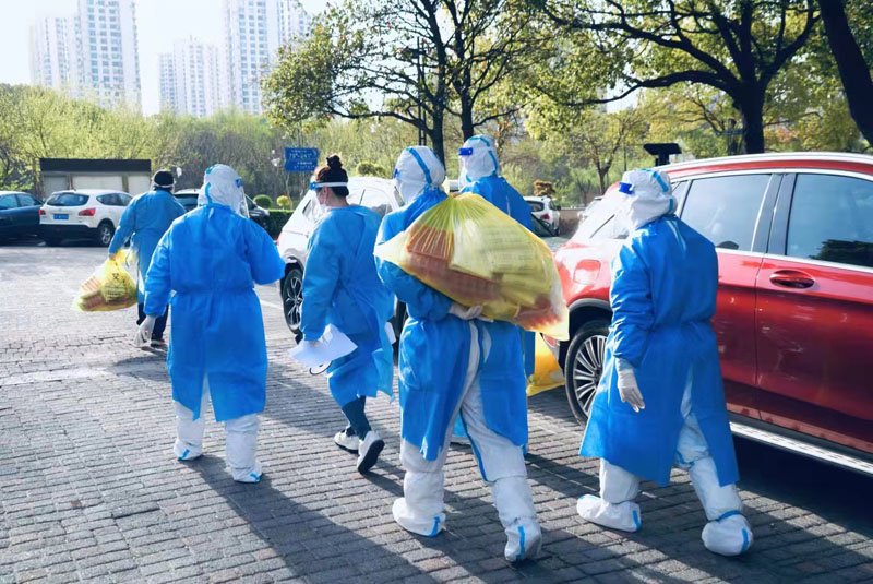 花儿依旧笑春风，一组图看申城战“疫”日常