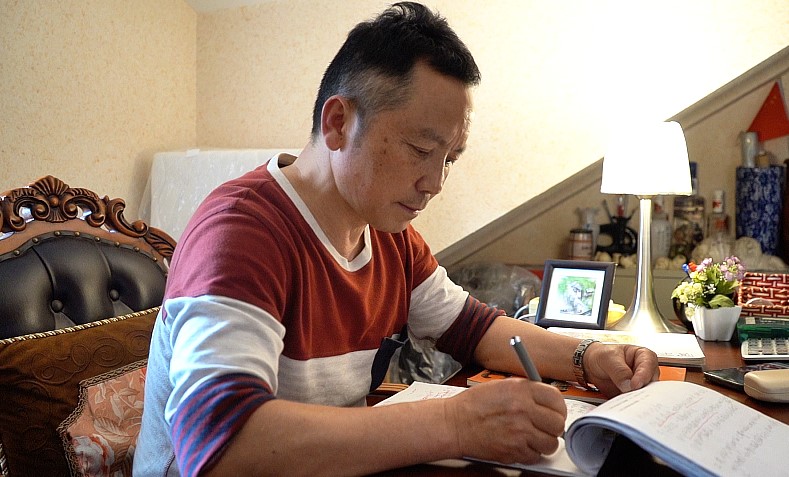 车轮上的业余词作家周良国：25年货车司机生涯写下400多首歌词