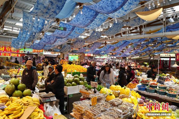 农贸市场里感受“有一种叫云南的生活”