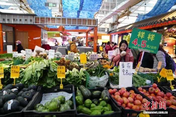 农贸市场里感受“有一种叫云南的生活”