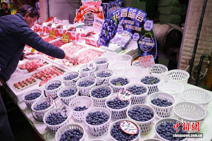 农贸市场里感受“有一种叫云南的生活”