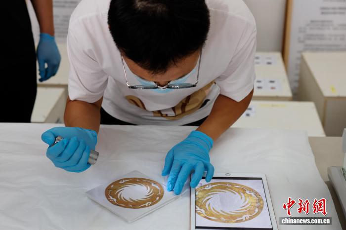 108件成都金沙遗址博物馆参展文物全部返蓉 太阳神鸟金饰完成点交